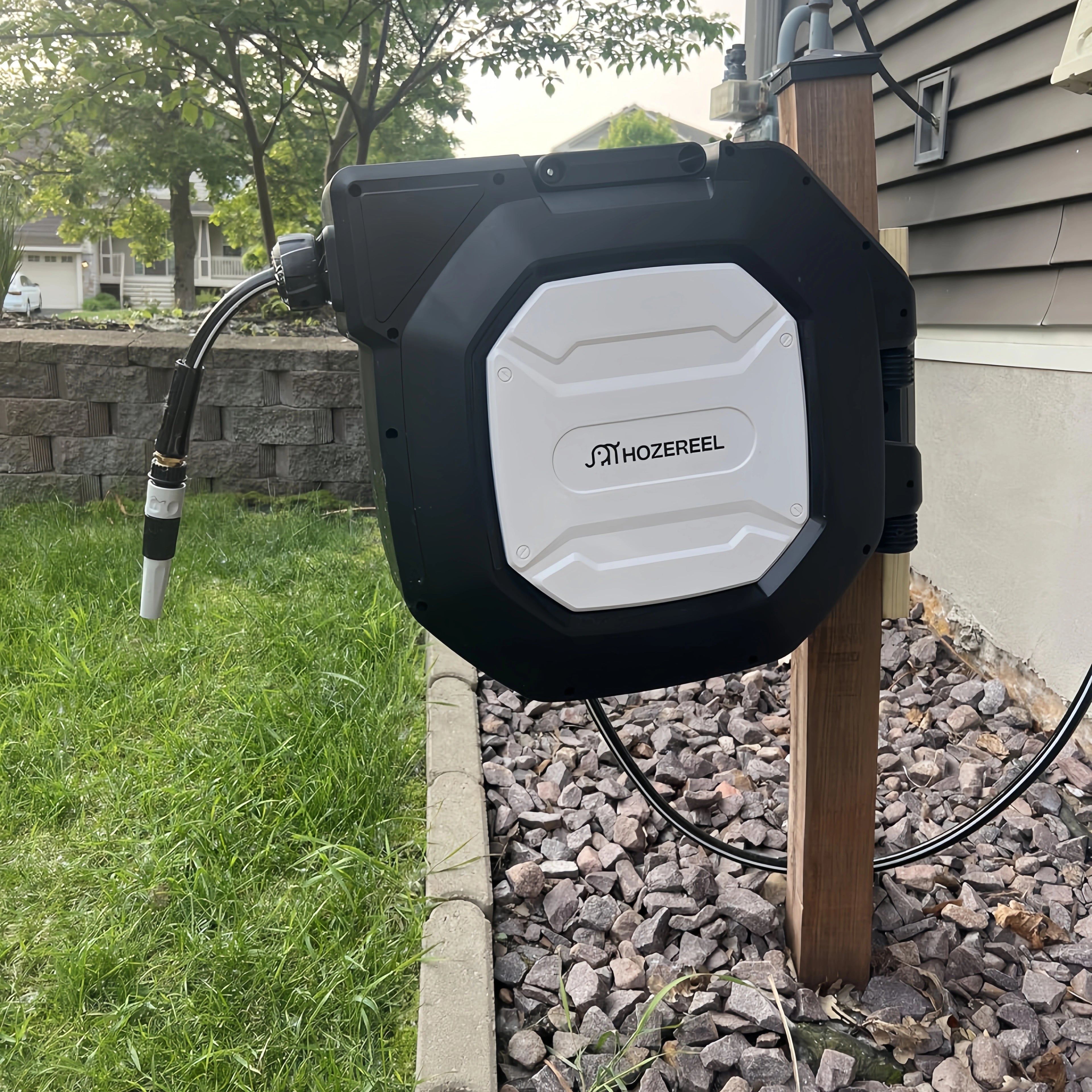 Hozereel 5/8" x 100FT Retractable Garden Hose Reel - Automatic Water Hose with 8 Nozzles