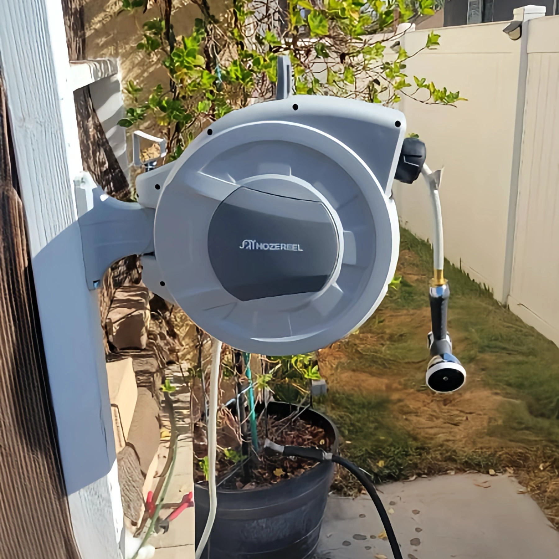 Compact 100ft Retractable Garden Hose Reel by HOZEREEL, 1/2" Hybrid Rubber Hose, Water Hose Reels Automatic Rewind Storage